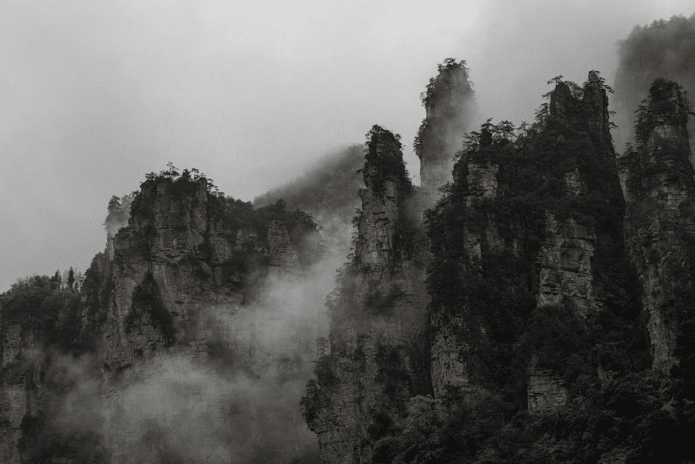 Towering stone pillars veiled in mist inspired the floating mountains in the movie Avatar (Source: Pexels)